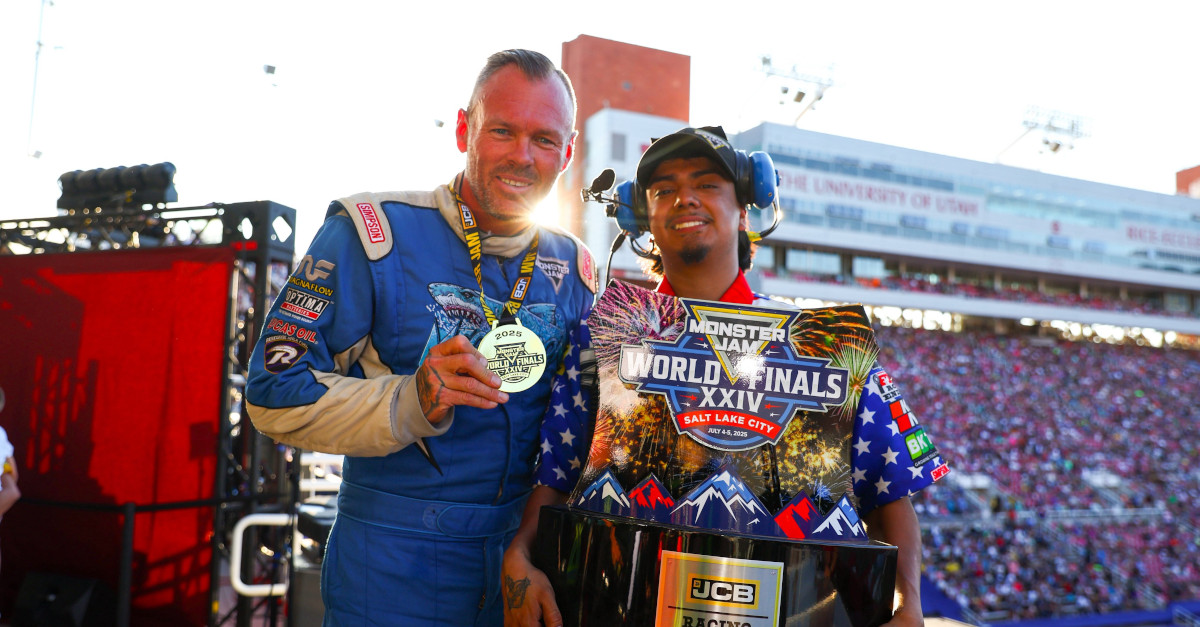 Todd LeDuc poses with his championship trophy